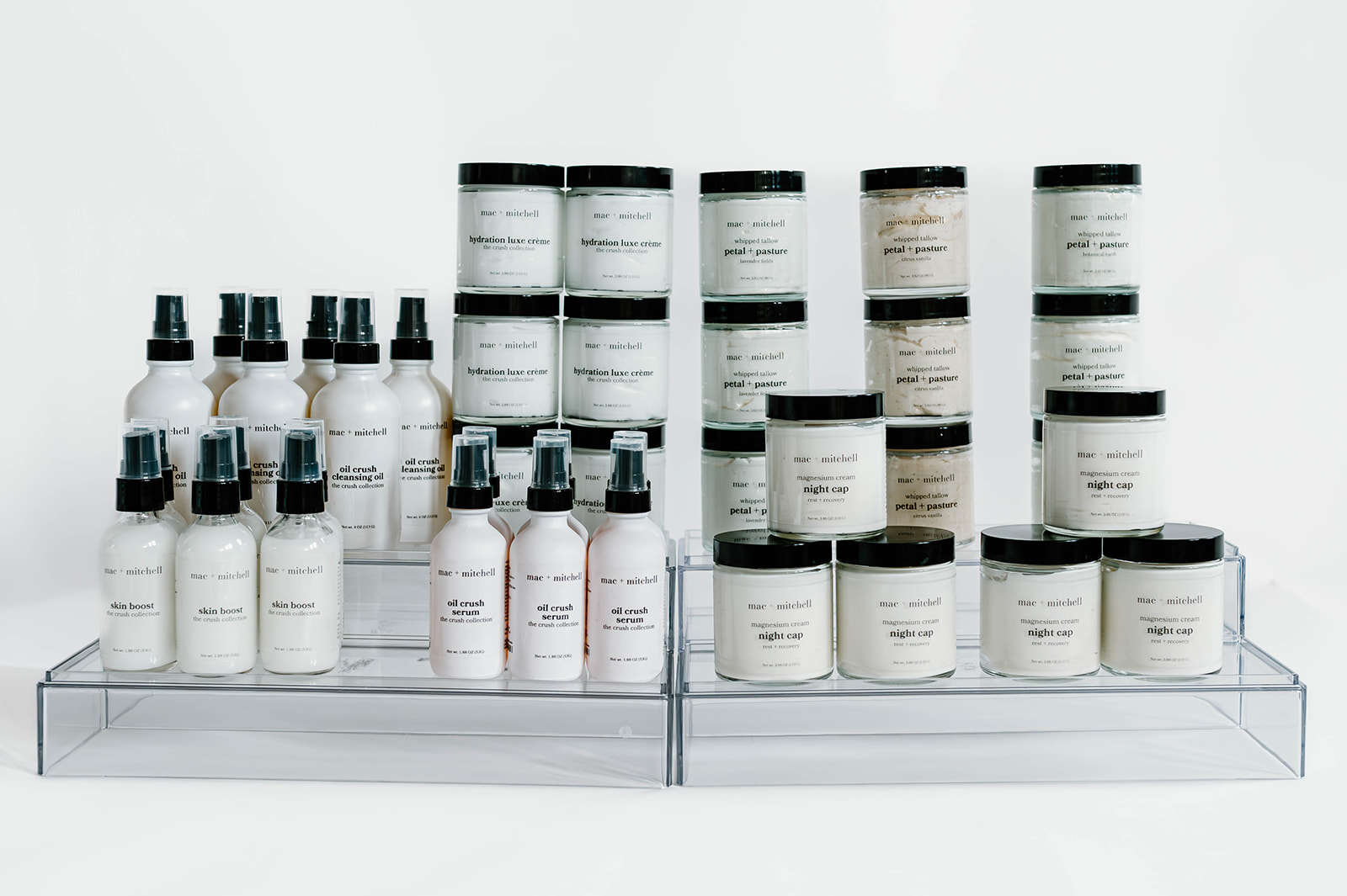 the founding shelf, the full lineup on clear acrylic risers