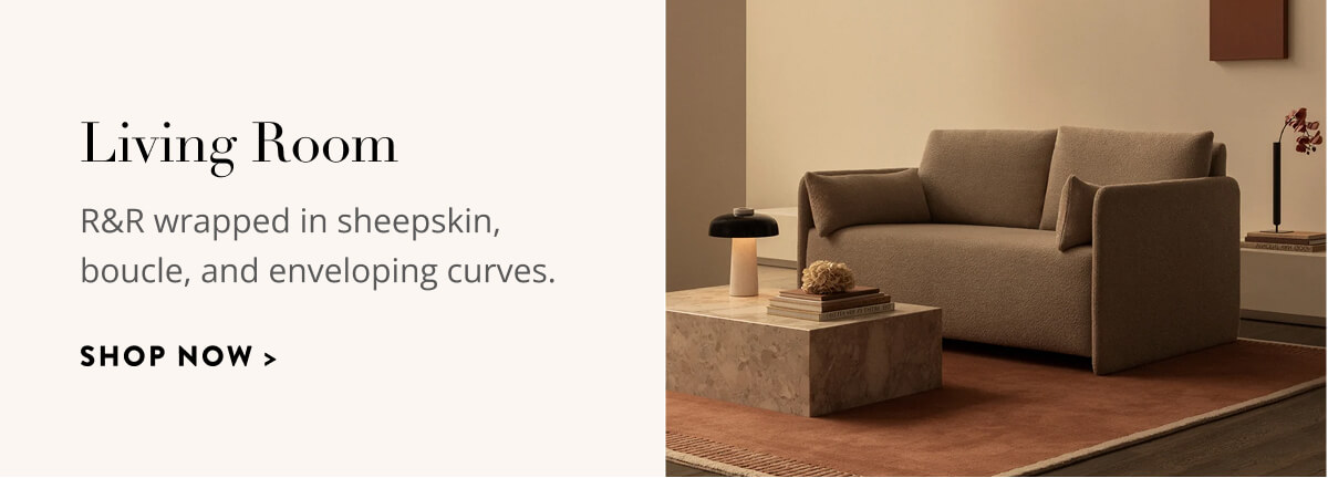 Living Room: R&R wrapped in sheepskin, boucle, and enveloping curves. Shop now.