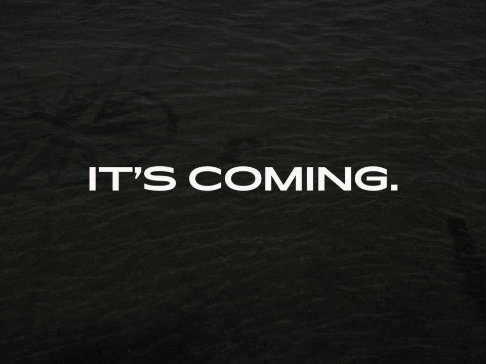 text that reads its coming over dark water and a weathered map